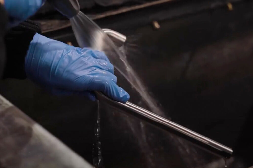 Borg and Overström stainless steel water dispenser tap being prepared in the Aalberts factory for PVD finishing.