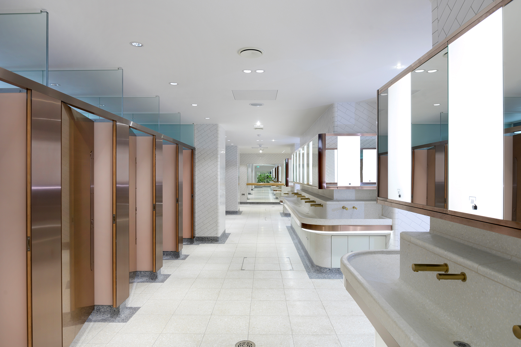 Taps, ironmongery, mirror trim and basin trim are in PVD coloured stainless steel Bronze Brush